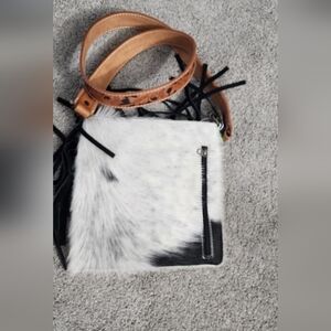 Elegant Black and White Fur Wristlet with Tan Strap